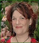 Woman speaking at Charlotte Garden Club program event.